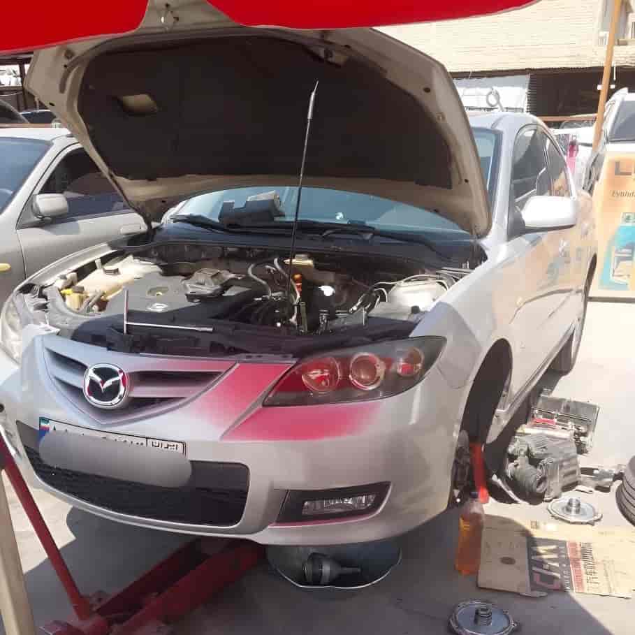 تعمیر و تنظیم سیستم تعلیق و جعبه فرمان مزدا